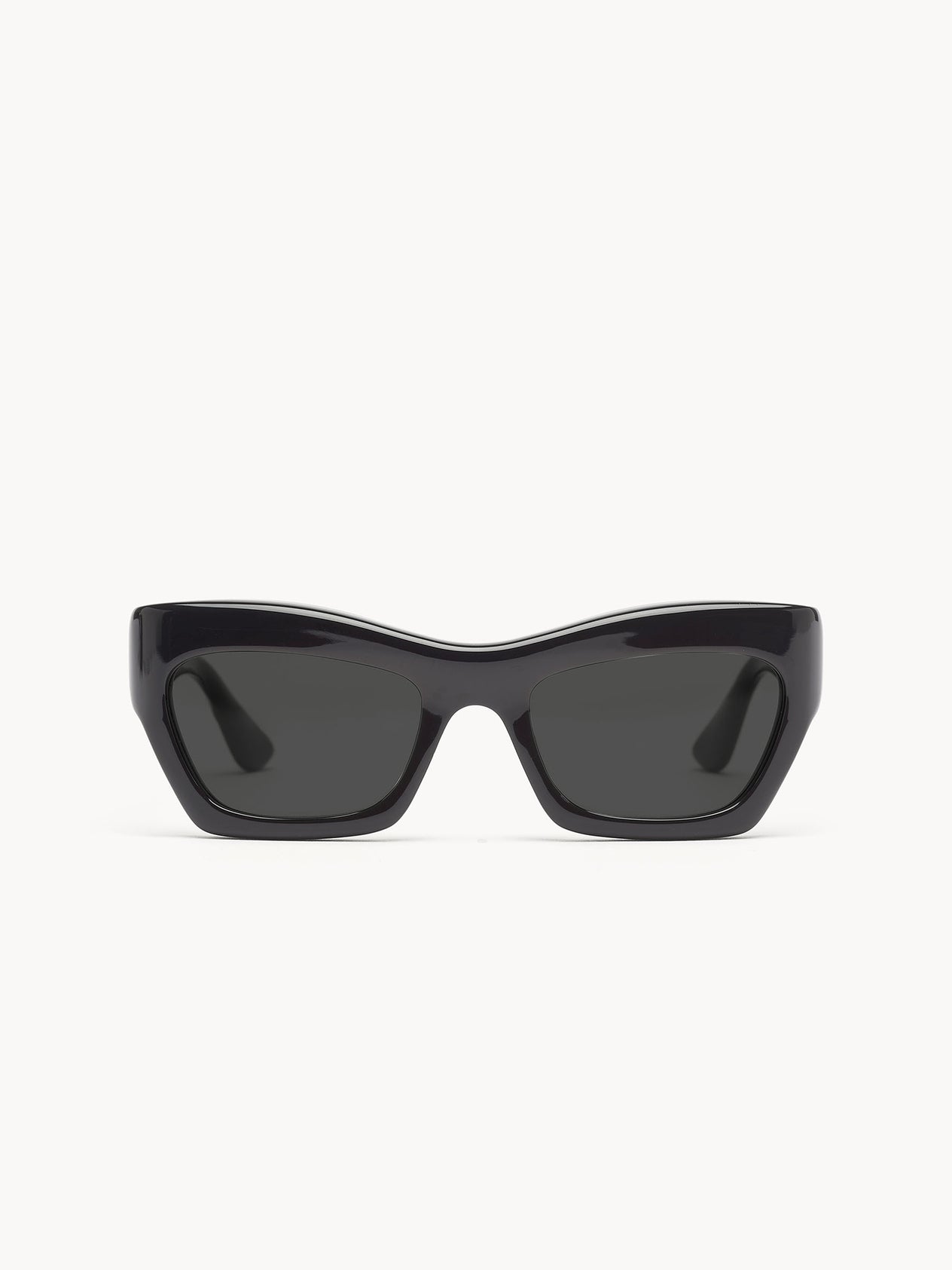 The Port Tanger Ayreen sunglasses by Port Tanger feature thick, bright yellow cat-eye frames with dark rectangular lenses, handcrafted in Japan and displayed against a plain white background.