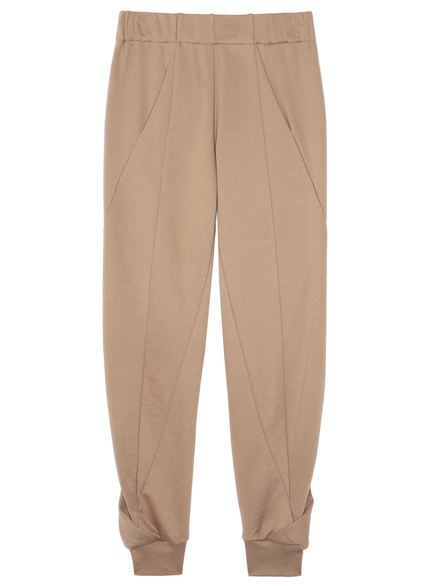 Akeo Sweatpant by Zero + Maria Cornejo features an elastic waist and ribbed ankle cuffs with stitched vertical seams and side pockets for style and comfort. Beige French Terry jogger pants on final sale.